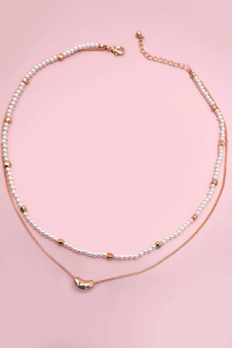 Double layer pearl and gold chain necklace with bean charm