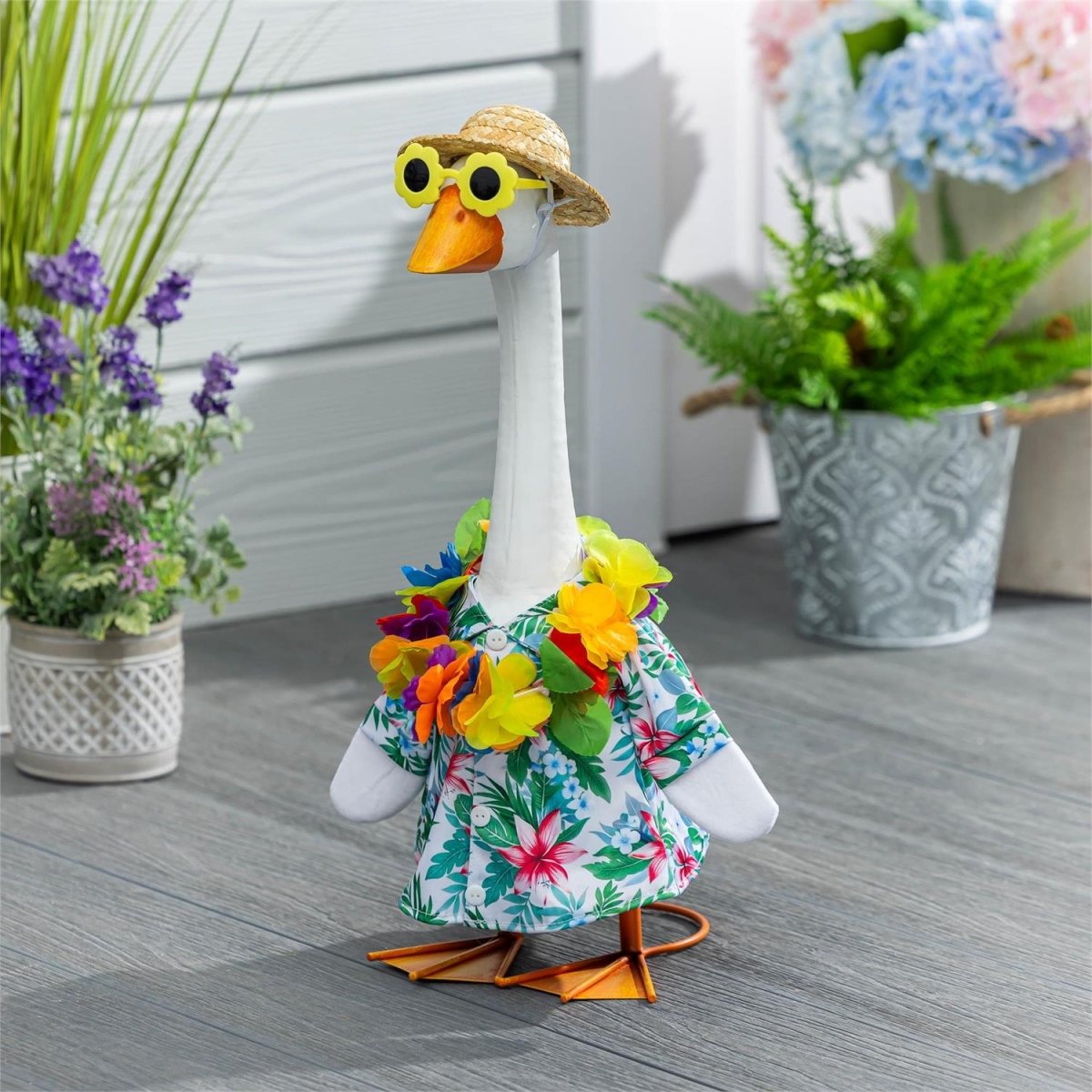 Porch goose statue dressed in a seasonal outfit