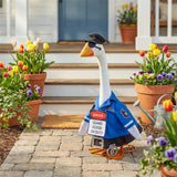 Porch goose statue dressed in a seasonal outfit