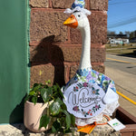 Porch goose in a hydrangea hat outfit