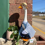 Porch goose in a gardener outfit