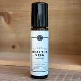 Rowe Casa Bottle of 'Healthy Vein' support on a wooden surface