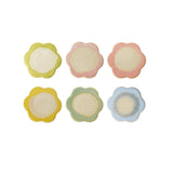 Flower-shaped stoneware trivet with a reactive crackle glaze finish