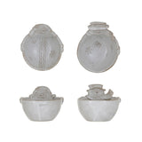 A stoneware bowl shaped like Santa or a snowman, one of two styles