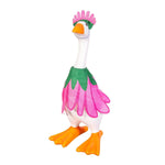 Table-sized goose figurine dressed in a mini outfit