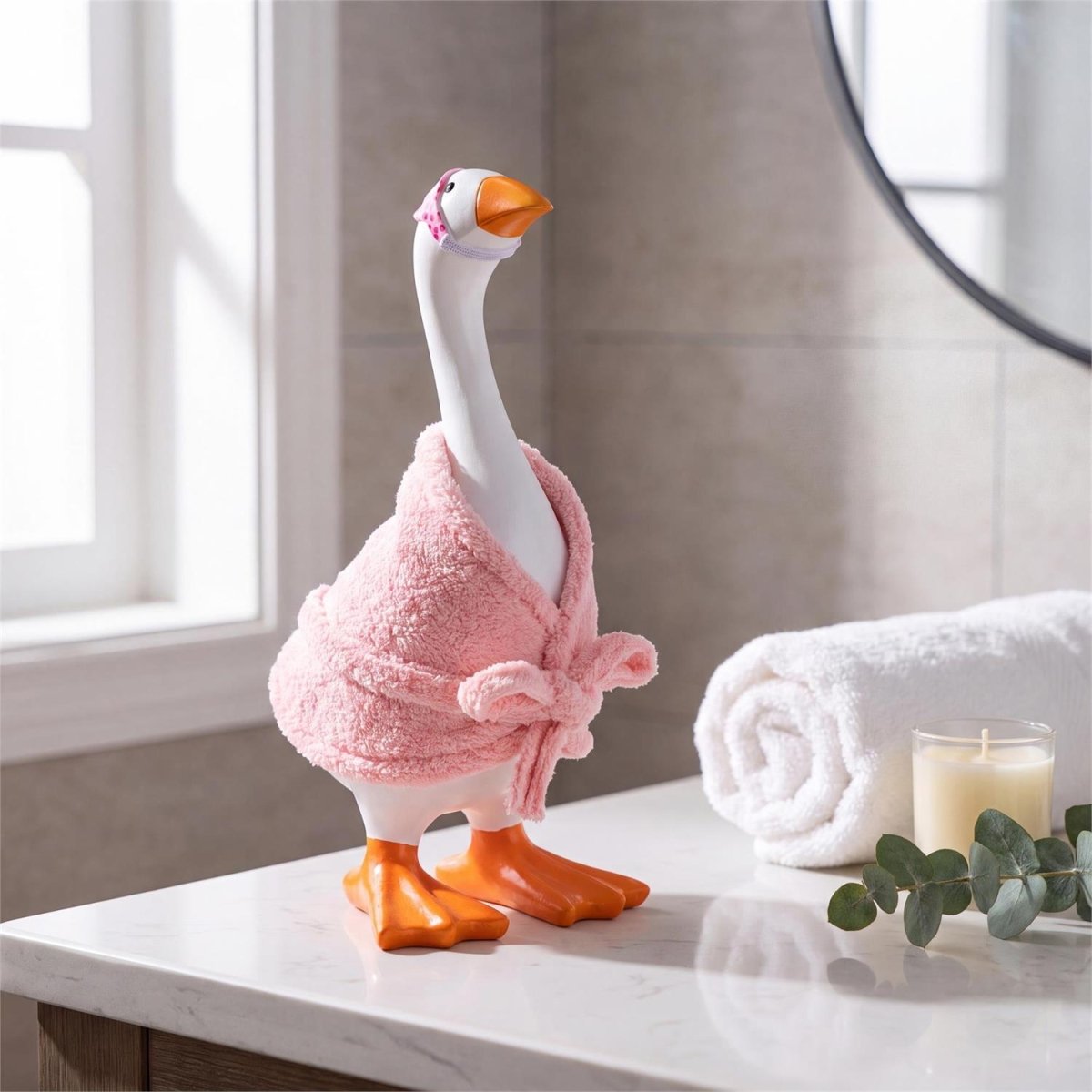 Table-sized goose figurine dressed in a mini outfit