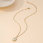 Tarnish-free stainless steel necklace with gold tulip enamel pendant