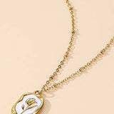 Tarnish-free stainless steel necklace with gold tulip enamel pendant