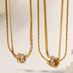 Tarnish-free stainless steel layered necklace with rhinestone circle pendant