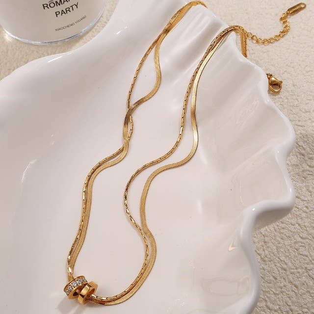 Tarnish-free stainless steel layered necklace with rhinestone circle pendant