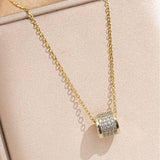 Tarnish-free stainless steel barrel necklace with rhinestone pendant