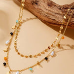 Tarnish-free stainless steel necklace with seed bead flowers and pearl drop