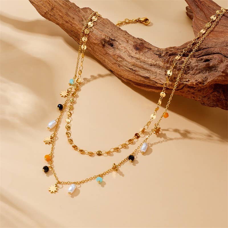Tarnish-free stainless steel necklace with seed bead flowers and pearl drop