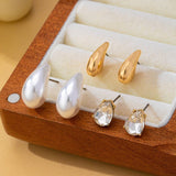 Teardrop crystal, gold-tone, and faux pearl trio stud earring set