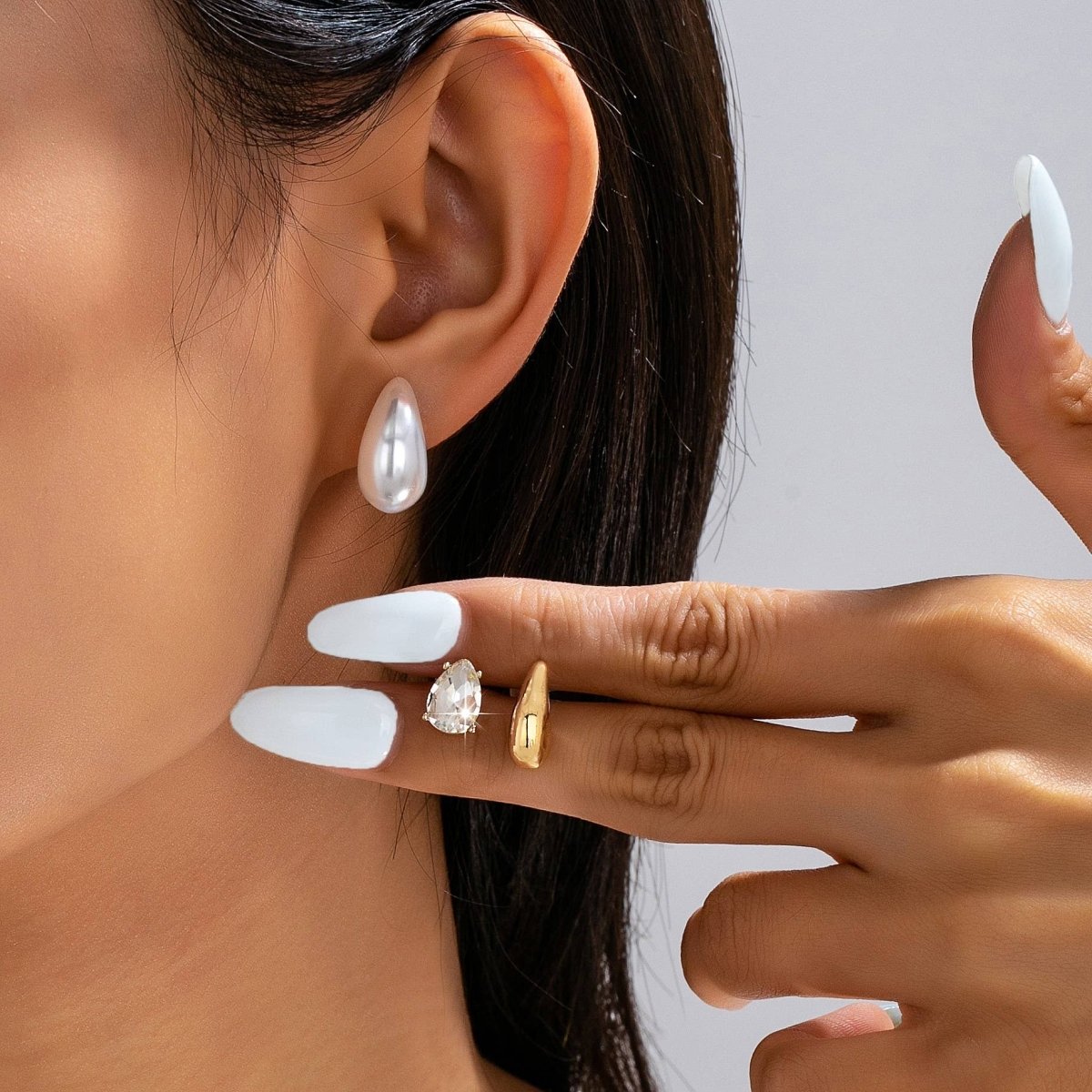 Teardrop crystal, gold-tone, and faux pearl trio stud earring set