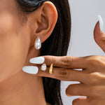 Teardrop crystal, gold-tone, and faux pearl trio stud earring set