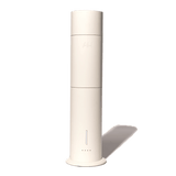 Aura House cold-air diffuser in cream aluminum, magnetic top removed to show oil chamber