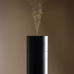 Close-up of fine cold-air mist releasing from the top of the Aura House diffuser