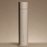 Aura House diffuser standing tall, showing its slim aluminum silhouette