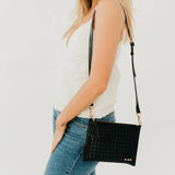 Woven vegan leather convertible crossbody and clutch bag