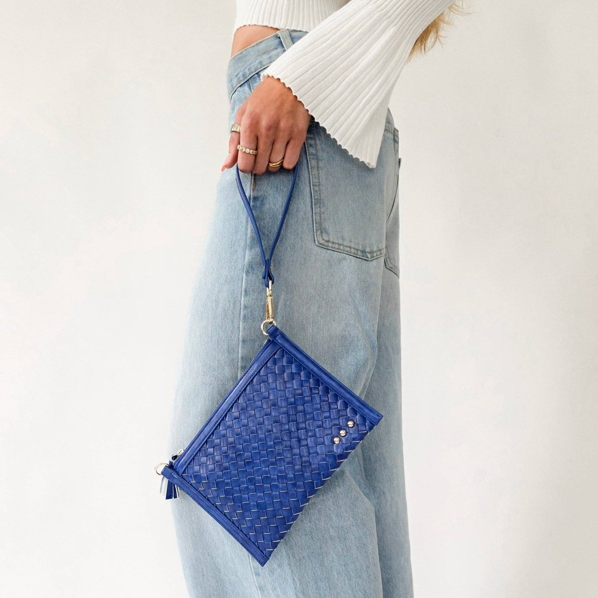 Woven vegan leather convertible crossbody and clutch bag