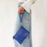 Woven vegan leather convertible crossbody and clutch bag