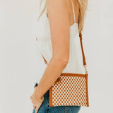 Woven vegan leather convertible crossbody and clutch bag