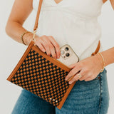 Woven vegan leather convertible crossbody and clutch bag