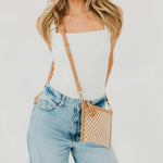 Woven vegan leather convertible crossbody and clutch bag