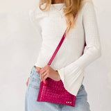 Woven vegan leather convertible crossbody and clutch bag
