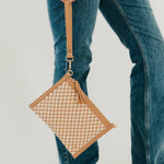 Woven vegan leather convertible crossbody and clutch bag