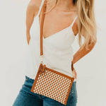 Woven vegan leather convertible crossbody and clutch bag