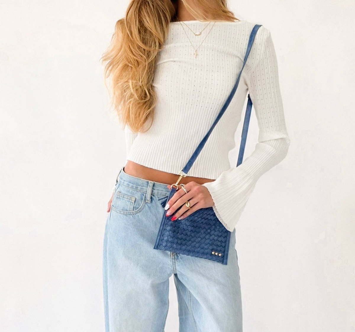 Woven vegan leather convertible crossbody and clutch bag