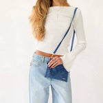 Woven vegan leather convertible crossbody and clutch bag