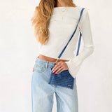 Woven vegan leather convertible crossbody and clutch bag