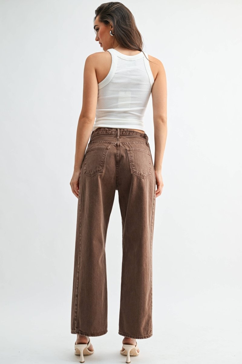 Vintage brown high-rise barrel jeans with a twist seam
