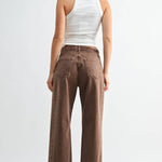 Vintage brown high-rise barrel jeans with a twist seam