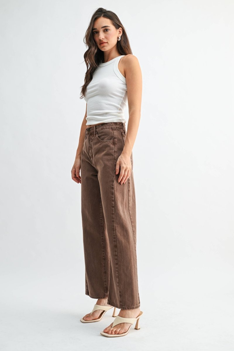 Vintage brown high-rise barrel jeans with a twist seam