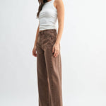 Vintage brown high-rise barrel jeans with a twist seam