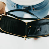 Woven crossbody phone bag with card slots and a coin purse