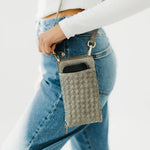 Woven crossbody phone bag with card slots and a coin purse