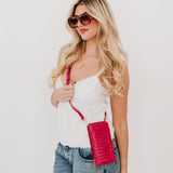 Woven crossbody phone bag with card slots and a coin purse